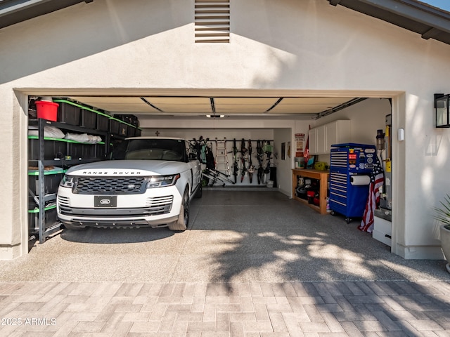 garage featuring driveway