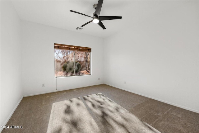 carpeted empty room with ceiling fan