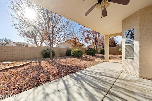 view of patio featuring ceiling fan