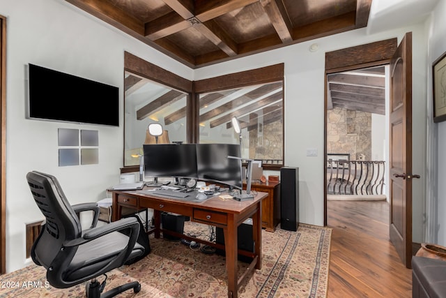 office with hardwood / wood-style floors and beamed ceiling