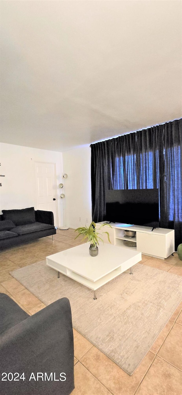 living room featuring light tile patterned floors