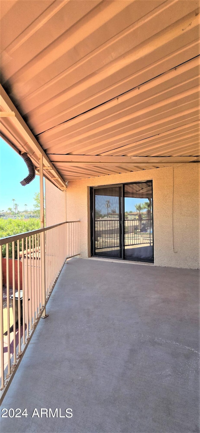 view of patio with a balcony