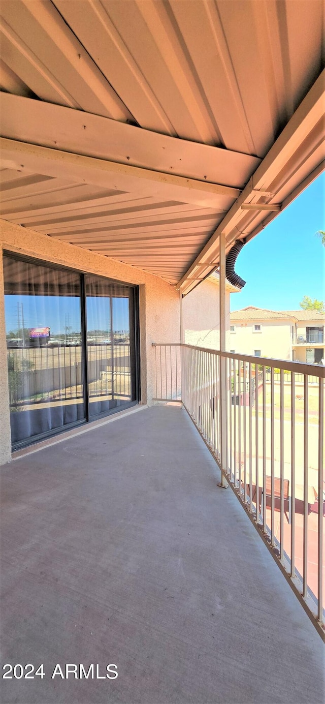 view of patio with a balcony