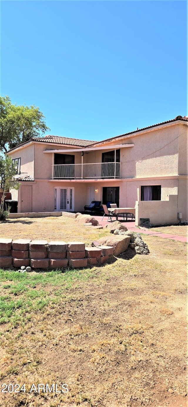 back of house featuring a patio