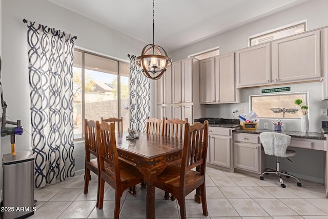 14806 E Crested Crown, Fountain Hills, AZ 85268 - dining room with light tile patterned floors, a chandelier, and built in desk