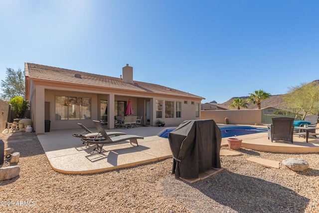 14806 E Crested Crown, Fountain Hills, AZ 85268 - rear view of house with a chimney, a fenced backyard, a patio, and stucco siding
