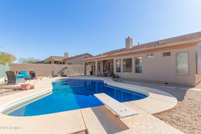 14806 E Crested Crown, Fountain Hills, AZ 85268 - view of swimming pool with a patio, a fenced backyard, and a diving board