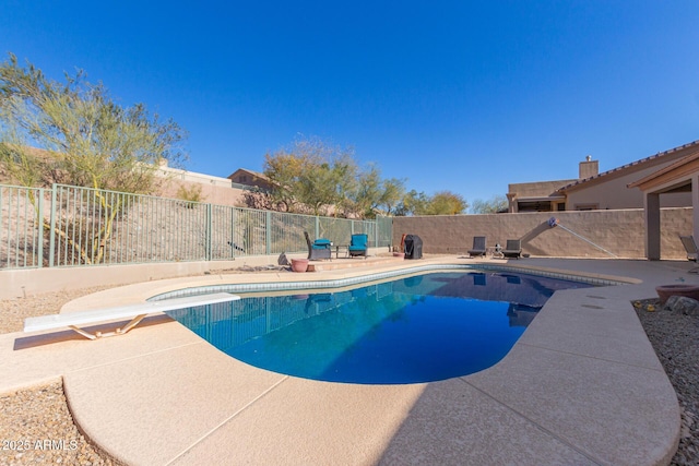 14806 E Crested Crown, Fountain Hills, AZ 85268 - view of swimming pool with a patio, a fenced backyard, and a diving board