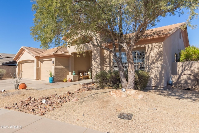 14806 E Crested Crown, Fountain Hills, AZ 85268 - view of front of property with stucco siding, a garage, concrete driveway, and a tile roof