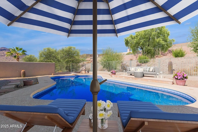14806 E Crested Crown, Fountain Hills, AZ 85268 - view of swimming pool with outdoor lounge area, a patio, and a fenced backyard