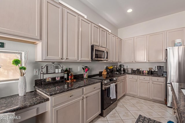 14806 E Crested Crown, Fountain Hills, AZ 85268 - kitchen featuring appliances with stainless steel finishes, light tile patterned floors, dark stone countertops, and recessed lighting