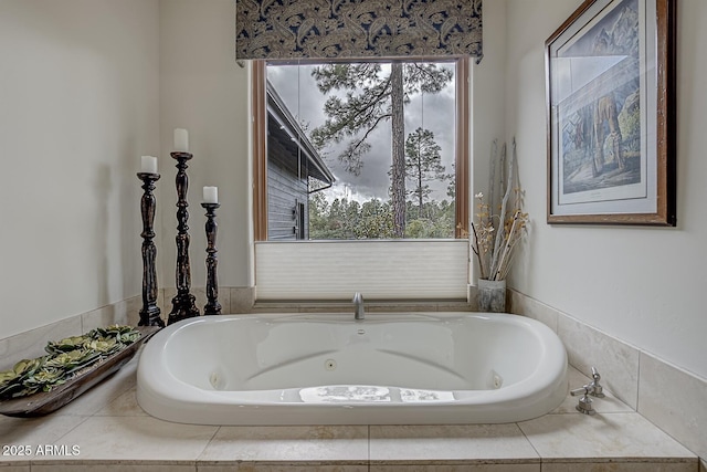 full bathroom with a whirlpool tub