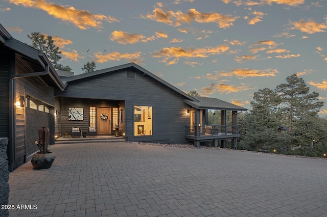 view of front of property with decorative driveway