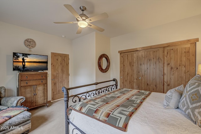 carpeted bedroom with a ceiling fan