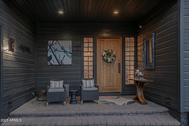 entrance to property with a porch