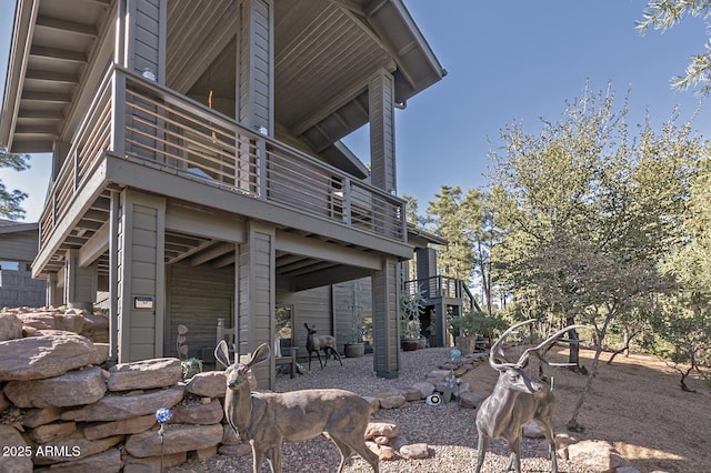 view of home's exterior featuring stairway