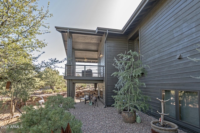 view of property exterior with a balcony