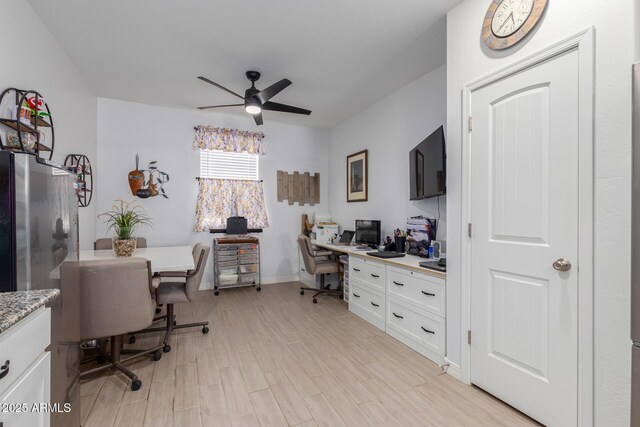 1463 W Pinkley Ave, Coolidge, AZ 85128 - office space with ceiling fan, built in desk, and light wood finished floors