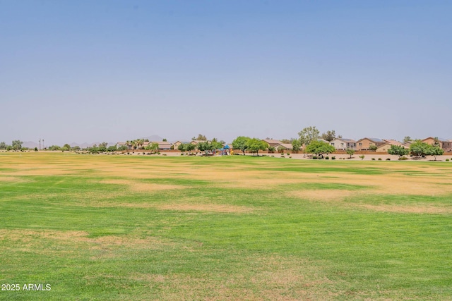 1463 W Pinkley Ave, Coolidge, AZ 85128 - view of community featuring a lawn and a residential view