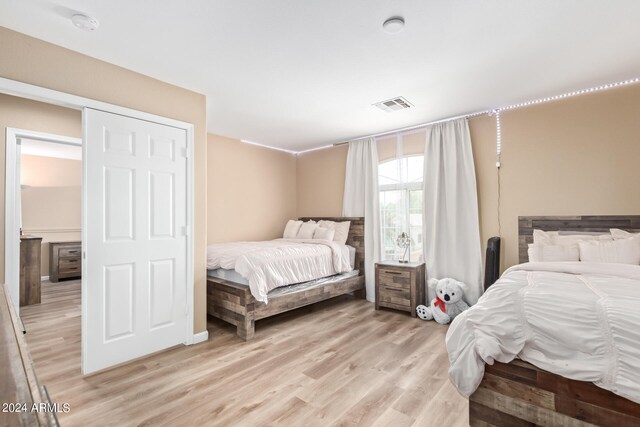 bedroom featuring light hardwood / wood-style flooring