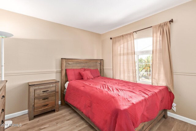 bedroom featuring light hardwood / wood-style floors