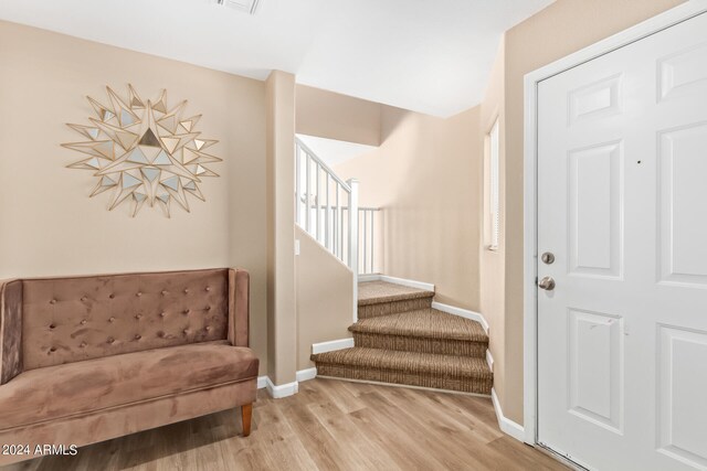 entrance foyer featuring light hardwood / wood-style floors