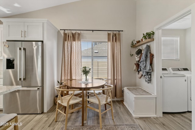 19039 N 47th Ave, Glendale, AZ 85308 - dining space with washer and clothes dryer and light wood-style floors
