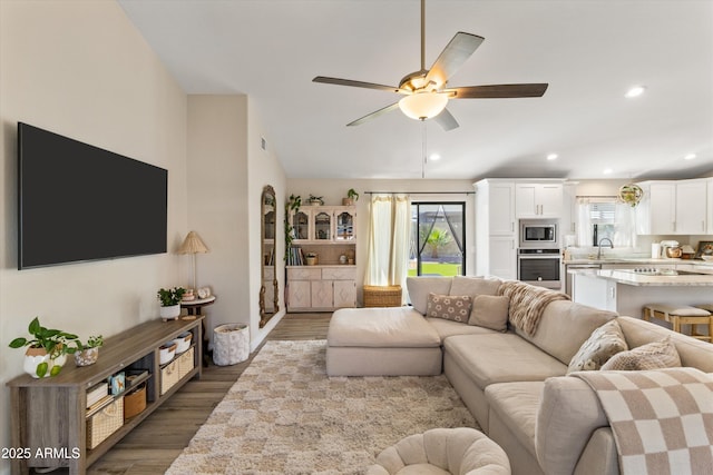19039 N 47th Ave, Glendale, AZ 85308 - living room featuring a ceiling fan, recessed lighting, and wood finished floors