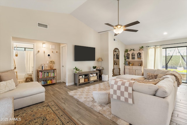 19039 N 47th Ave, Glendale, AZ 85308 - living area featuring a ceiling fan, light wood-style floors, high vaulted ceiling, and baseboards