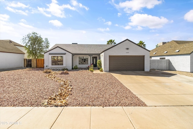 19039 N 47th Ave, Glendale, AZ 85308 - single story home with driveway, an attached garage, fence, and stucco siding