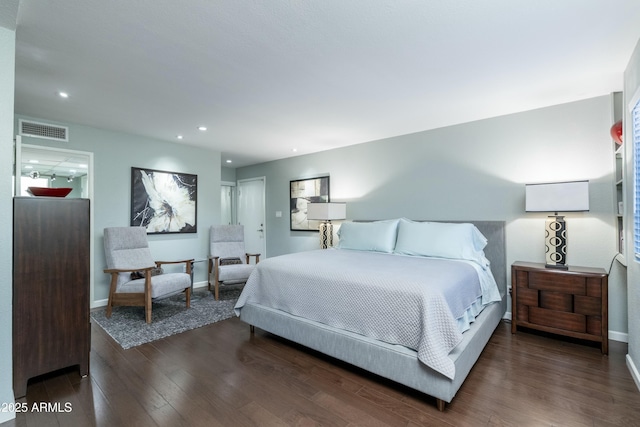 bedroom featuring recessed lighting, visible vents, baseboards, and wood finished floors