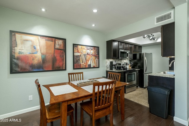 dining area with recessed lighting, visible vents, baseboards, and dark wood finished floors