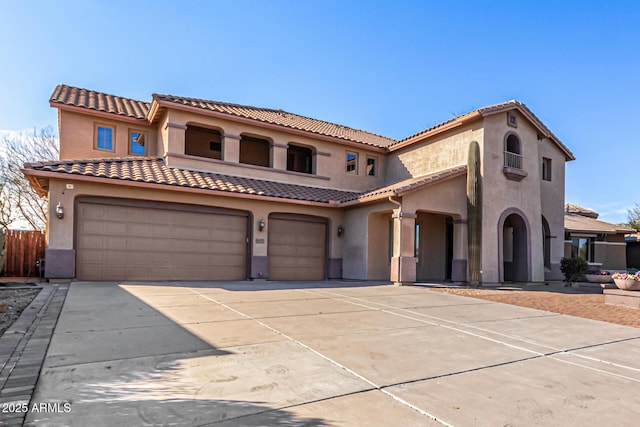 mediterranean / spanish-style house featuring a garage