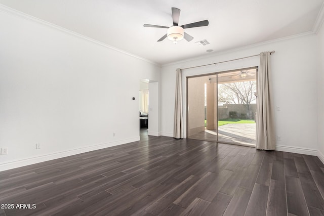 empty room with dark wood-type flooring, ornamental molding, and ceiling fan