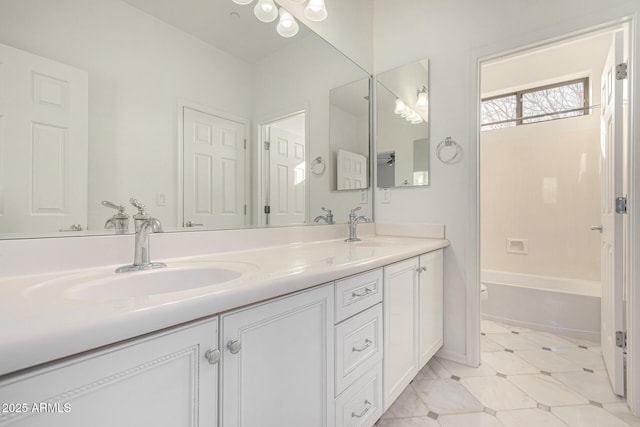 bathroom featuring vanity and tub / shower combination