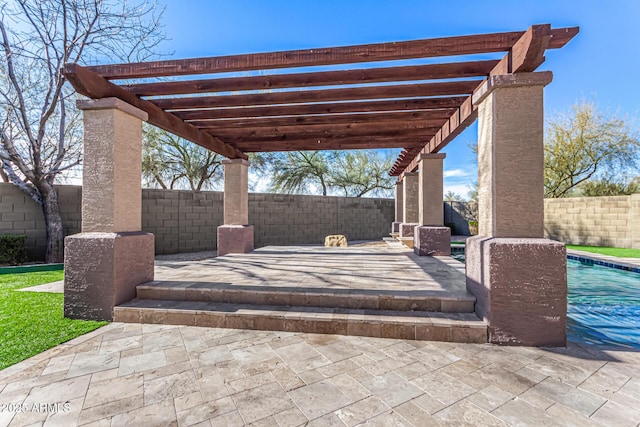 view of patio with a fenced in pool and a pergola