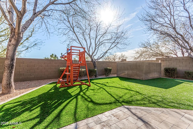 view of yard with a playground