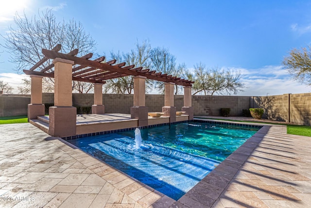 view of pool featuring pool water feature, a patio area, and a pergola