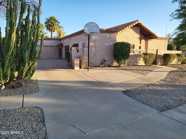 5323 W N Ln, Glendale, AZ 85302 - view of front of house with stucco siding and a gate