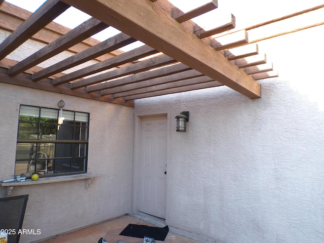 5323 W N Ln, Glendale, AZ 85302 - entrance to property featuring stucco siding and a pergola
