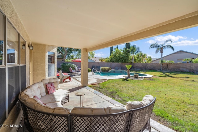 view of patio with a fenced in pool