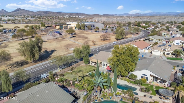 birds eye view of property featuring a mountain view