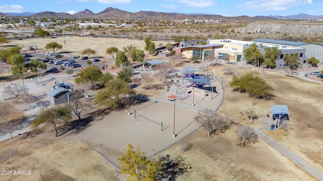 birds eye view of property featuring a mountain view