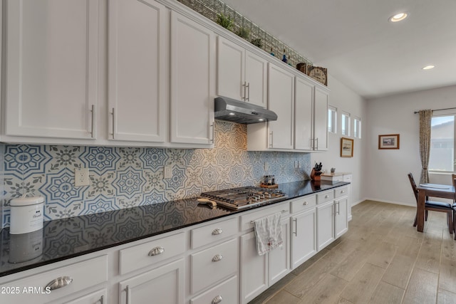 22927 E Via Del Oro, Queen Creek, AZ 85142 - kitchen featuring under cabinet range hood, baseboards, decorative backsplash, stainless steel gas cooktop, and recessed lighting