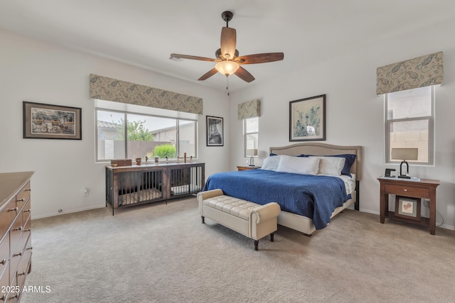 22927 E Via Del Oro, Queen Creek, AZ 85142 - carpeted bedroom with baseboards, access to outside, and a ceiling fan