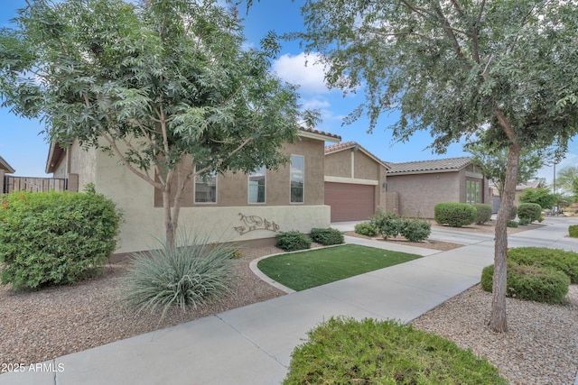 22927 E Via Del Oro, Queen Creek, AZ 85142 - view of front of property featuring stucco siding, a garage, concrete driveway, and a tile roof