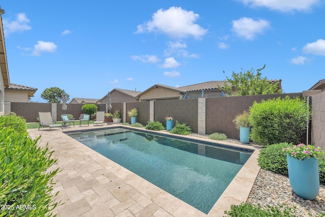 22927 E Via Del Oro, Queen Creek, AZ 85142 - view of swimming pool featuring a fenced backyard and a patio
