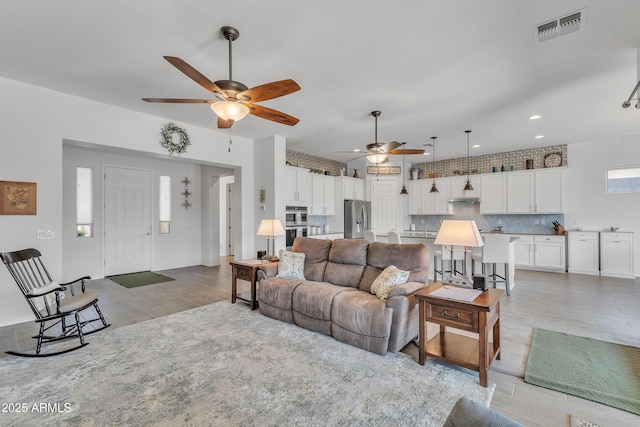 22927 E Via Del Oro, Queen Creek, AZ 85142 - living room featuring ceiling fan, light wood-type flooring, and recessed lighting