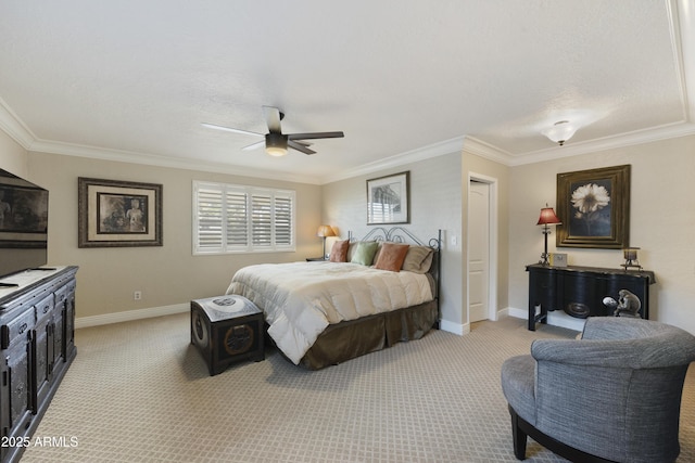 bedroom with light carpet, ornamental molding, and baseboards