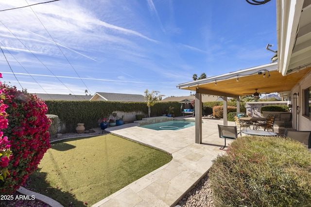 view of pool with a fenced in pool, a fenced backyard, and a patio